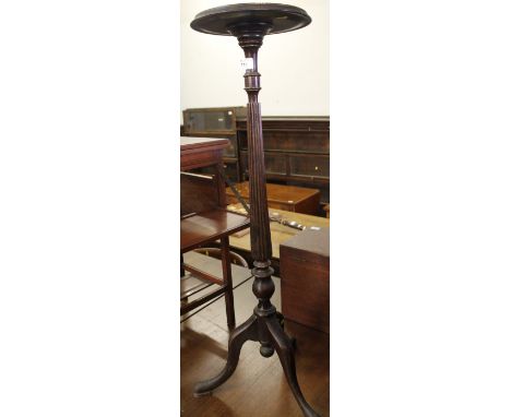 Mahogany tripod jardiniere stand on fluted base. 