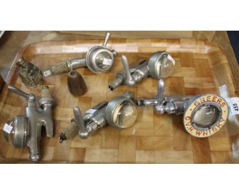 Five vintage chrome and glass optic measures including Greers O.V.H. whiskey together with a plated lighter in the form of an