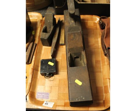 Two vintage block planes, spirit level, folding rule and a black plastic marching compass. (5)