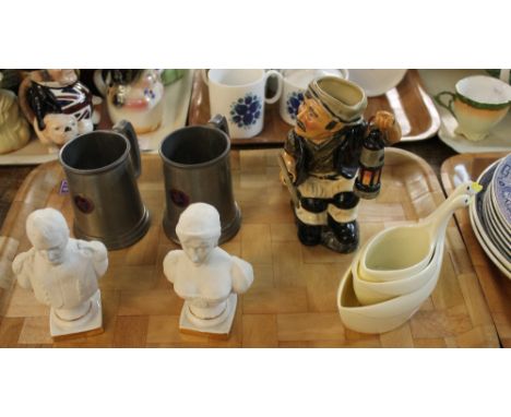 Tray of assorted items to include set of three graduated plastic cups in the form of geese, pair of Parian ware type busts of