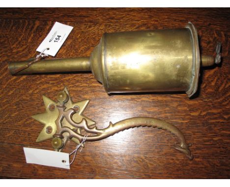 Brass bottle jack and wall bracket. (2)