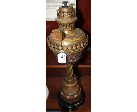 Late 19th century brass oil lamp in Gothic taste with brass reservoir, spiral column, and domed base. 
