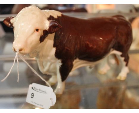 Beswick china Hereford bull. Printed marks.  CONDITION REPORT: There is glue to the bull's nose ring.
May have been off?
Othe