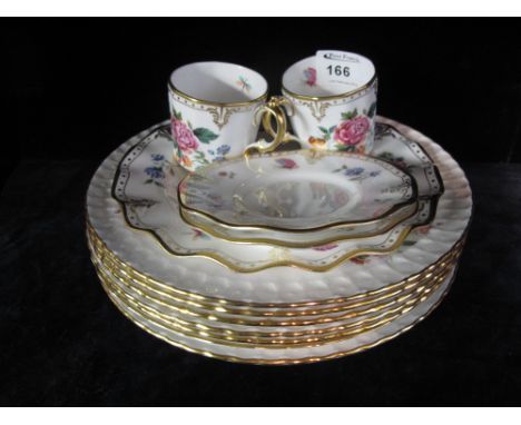 Seven Royal Crown Derby floral plates together with Royal Crown Derby 'Derby Days' side plate and two cups and saucers. 