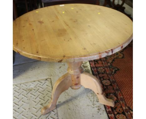 Modern pine circular tripod centre table. 