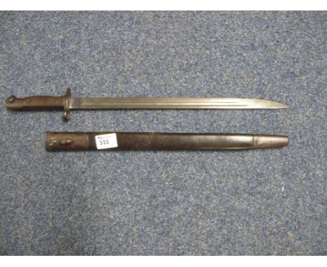 1907 pattern WWI Period British Lee Enfield sword bayonet with metal mounted leather scabbard. 