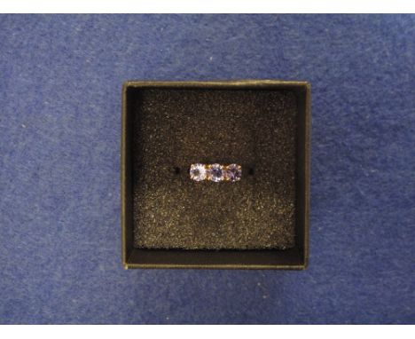 9ct gold three stone tanzanite ring. 