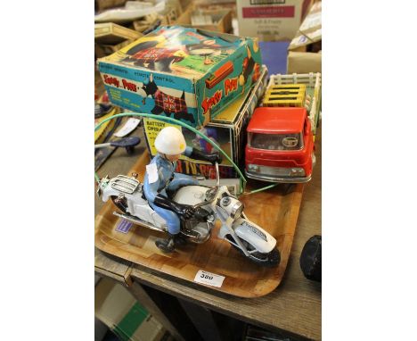 Japanese tinplate Ol' McDonalds farm truck with reticulated chickens. Japanese remote control motorbike rider battery operate