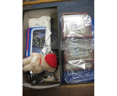 Box of assorted military collectibles including small aircraft prints, model aircraft, jeep table lighter, Corgi German half 