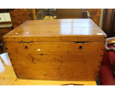 Vintage pine rectangular trunk.  CONDITION REPORT: Some losses to front. shrinkage split to top