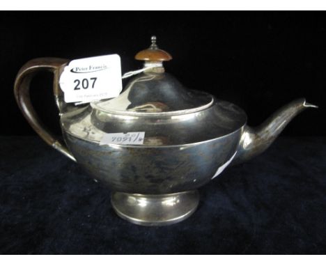 Silver squat teapot with swept handle, London 1914. 