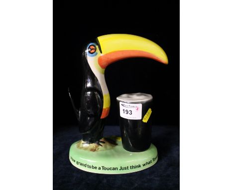 Reproduction Carlton Ware style Guinness promotional table lamp base depicting toucan with a pint of Guinness, 'How grand to 