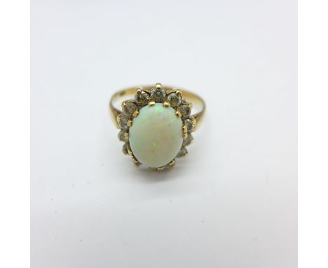 A 9ct gold and opal ring, 2.5g, O