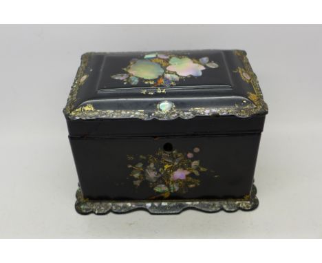 An early 19th Century papier mache tea caddy by Jennens &amp; Bettridge, hand decorated and inlaid with mother of pearl, a/f