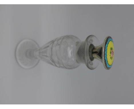 A silver and enamel topped cut glass scent bottle, a/f, (adapted stopper, enamel and glass matched)