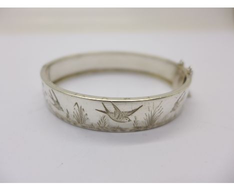 A Victorian white metal bangle