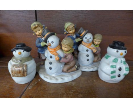 Two Goebel Snowman figures, Crowning Touch and a Wade Snowman salt and pepper pot