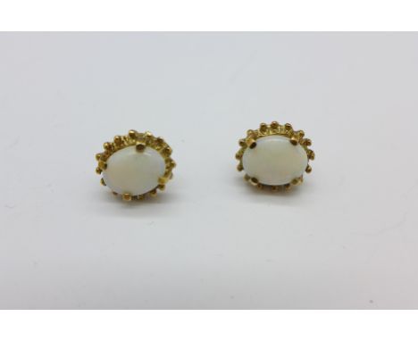A pair of 9ct gold and opal earrings, 2.3g