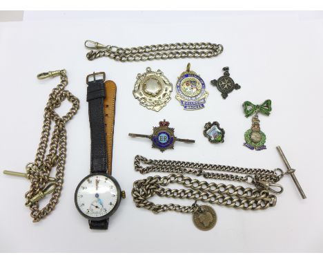 Two silver and enamel badges, Royal Marines and RASC, a silver cased wristwatch, two silver chains, other chains and two fobs