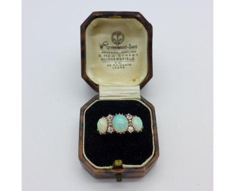 An 18ct gold, opal and diamond ring, 4.1g, N