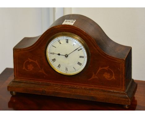 An Edwardian mahogany inlaid mantel clock, the dial movement made from brass military shell casing, white enamel dial, 18cm h