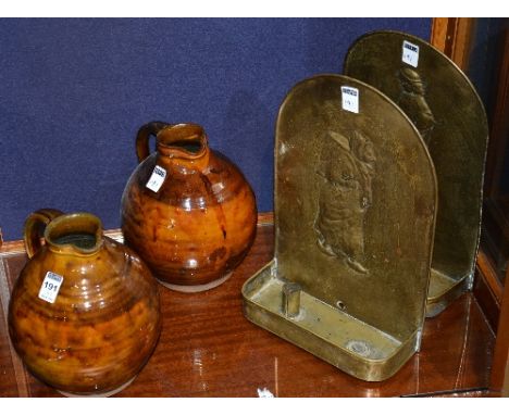A pair of Art Pottery ewers, 24cm high, also with a pair of vintage brass candle sconces, 36cm high (4)