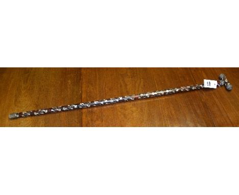 An Eastern tortoiseshell, mother of pearl and white metal walking stick, the top section on removable dowel fitting, 100cm lo