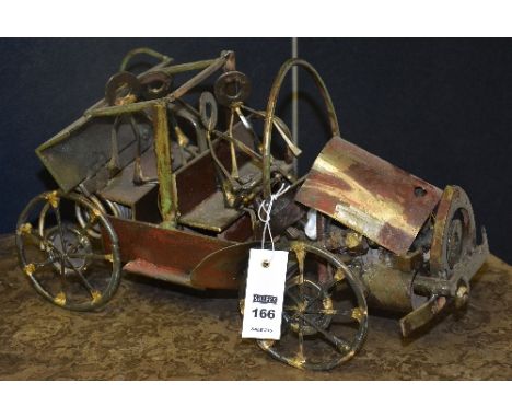 A Scrap metal model toy of a vintage car, 41cm long