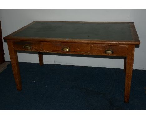 A vintage oak captains style desk, with plank top, above large drawer, flanked by a small drawer, 77cm high x 153cm wide x 91
