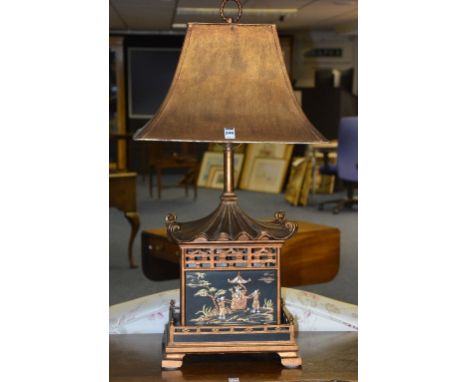 A Chinoisserie table lamp, in the form of a pagoda, with colourful panels of figures on black ground, with gilded painted sha