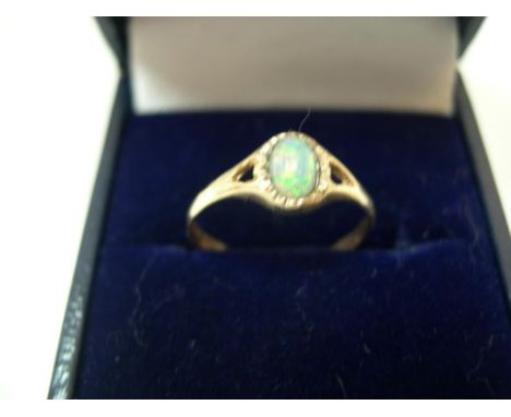 9ct yellow gold & opal ringApprox 0.9 grams gross,             size K 
