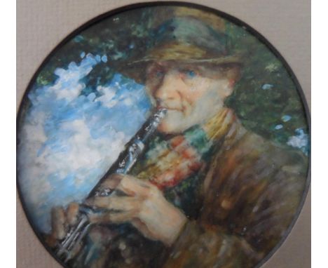 Unsigned, early 20thC circular miniature portrait of a man playing a flute in beaten pewter frame,The portrait measures 15 cm