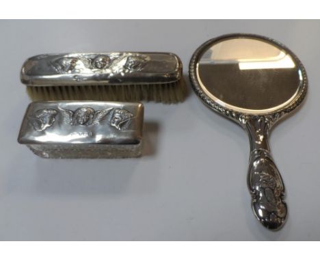 Birmingham 1906 silver backed 3-piece vanity set comprising mirror, brush & trinket box, each piece adorned with images of wi