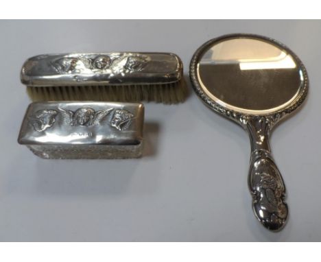 Birmingham 1906 silver backed 3-piece vanity set comprising mirror, brush & trinket box, each piece adorned with images of wi