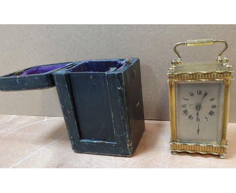 Cased antique brass cased carriage clock timepiece, Needs platform escapement.