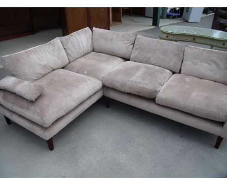 Modern contemporary corner fitting sofa on square tapering supports 