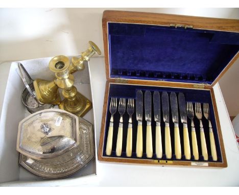 Part cased fish knife &amp; fork set, pair of brass candlesticks, silver plated cruet stand and a large butter dish 