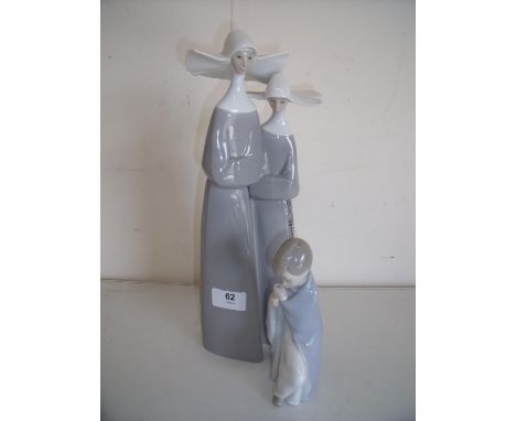 Lladro figure of two nuns and another of a kneeling boy (2) 