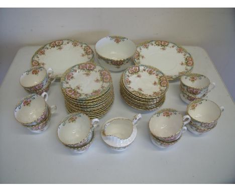 Forty piece Hughes Fenton floral pattern tea service, 12 cups and saucers, 12 tea plates, 2 sandwich plates, sugar bowl and a