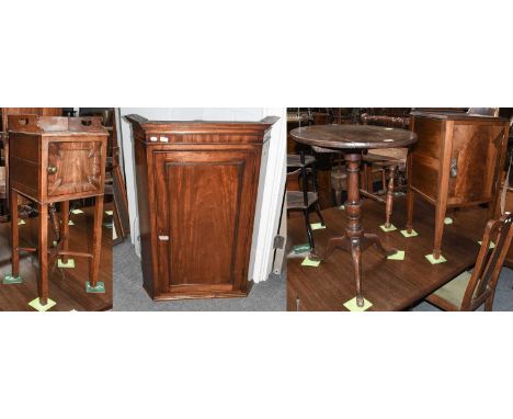 An early 19th century mahogany pot cupboard with raised gallery, bobbin turned mouldings and X frame cross stretcher, 33cm by