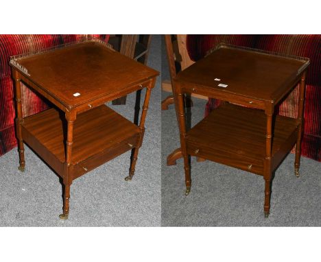 A pair of 20th century Regency style crossbanded mahogany end tables with pierced brass galleries, each with a slide single d