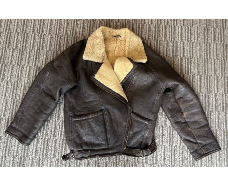 A leather jacket, and a pair of Harley Davidson leather boots, size 7
