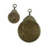 TWO DECORATIVE ISLAMIC BRASS ASTROLABES