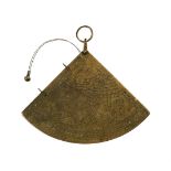 AN ISLAMIC ENGRAVED BRASS ASTROLABIC QUADRANT
