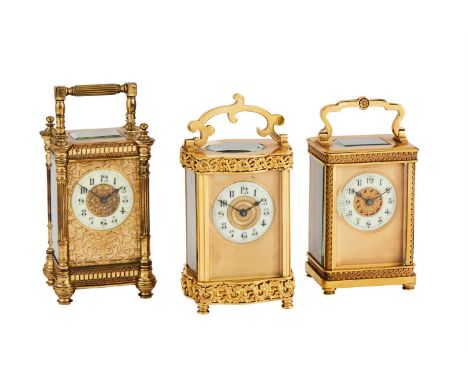 THREE FRENCH GILT BRASS CARRIAGE TIMEPIECESALL UNSIGNED, CIRCA 1900Each with eight-day single train movement, one with platfo