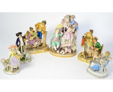 ^ A 19th century Meissen porcelain figure group as a mother and children playing cards, 25cm; a pair of Vienna style figure g