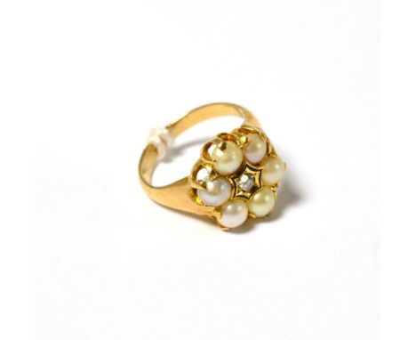 A diamond and split pearl cluster ring, a rose cut diamond centres a black enamel line border within a border of split pearls