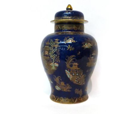 * A Carltonware powder blue ground baluster jar and cover with chinoiserie decoration, 33cm high