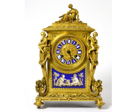 An ormolu and porcelain mounted striking mantel clock, circa 1890, acanthus leaf and scroll borders, figural mounts and dark 