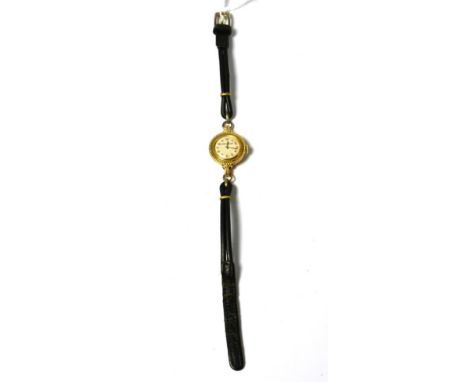 A lady's 9ct gold wristwatch, signed Jaeger LeCoultre, 1956, lever movement signed and numbered 1132000, silvered dial with A
